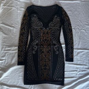 Stylish Black Dress with Gold Accents